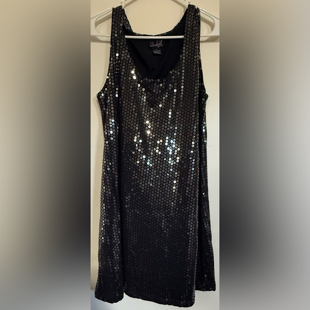 Questions by say what Black Sequin Dress